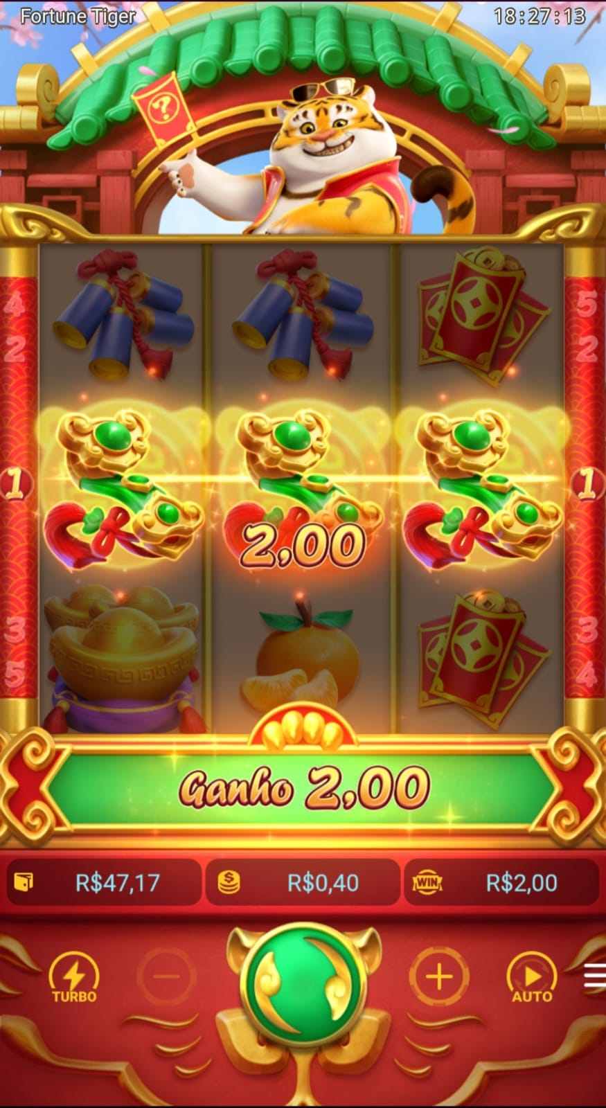 Ganho de 2 reais no Fortune Tiger com o símbolo de esmeralda alinhado na bobina central